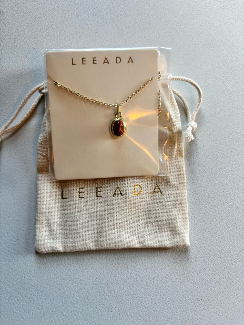 NWT LEEADA Gold Necklace with Red Oval Pendant